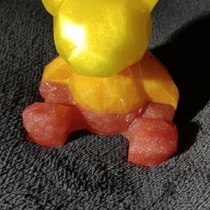 Yellow Orange And Pink Sun Rise Bear Figurine
